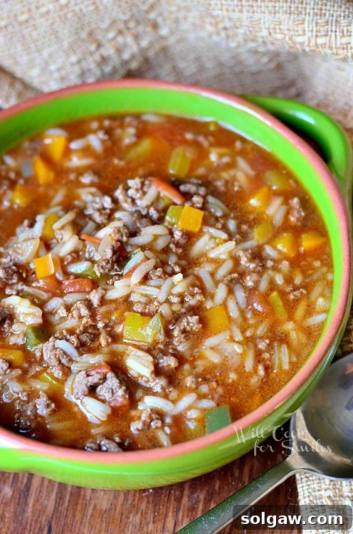 top view photo of Stuffed Peppers Soup in a green soup bowl 