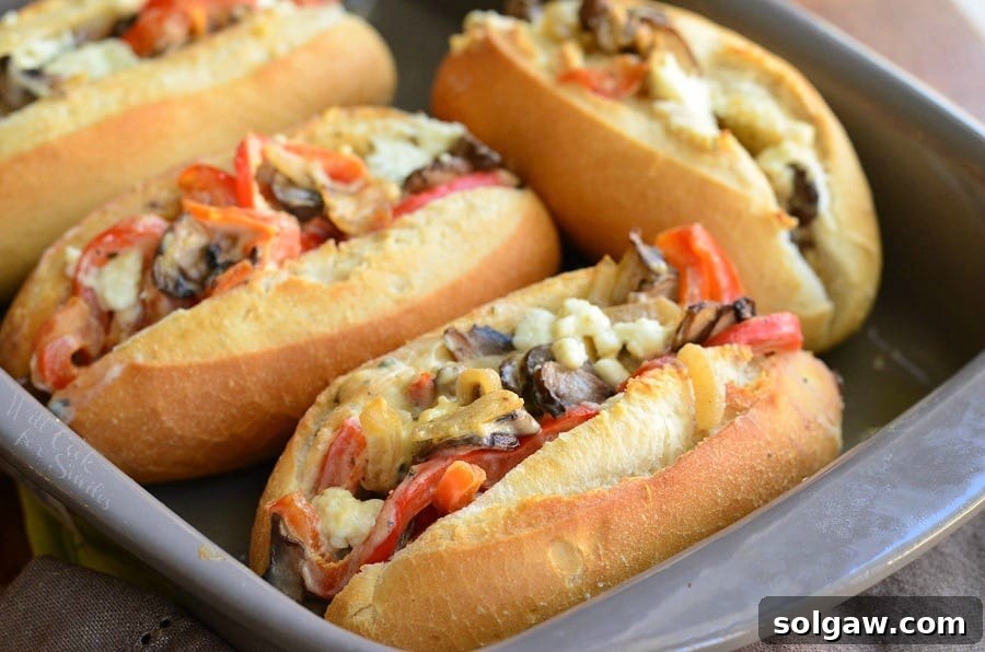 Baked Mini Veggie and Cheese Sandwiches, a top-down view showing their inviting texture.
