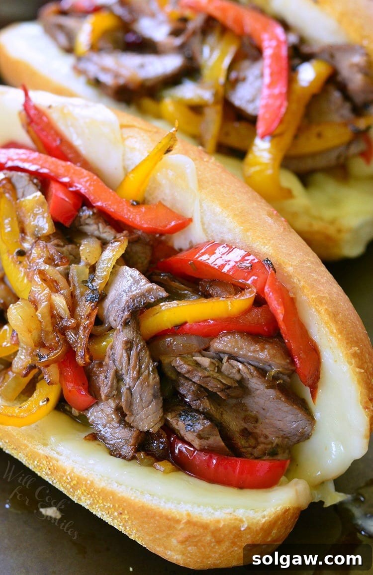 Top view of delicious Fajita Philly Steak Sandwiches, packed with colorful fillings