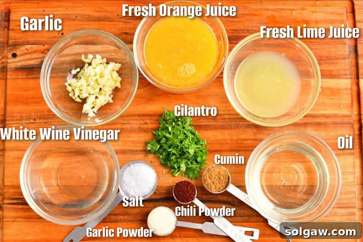 Labeled ingredients for a flavorful carne asada steak marinade including citrus, herbs, and spices.