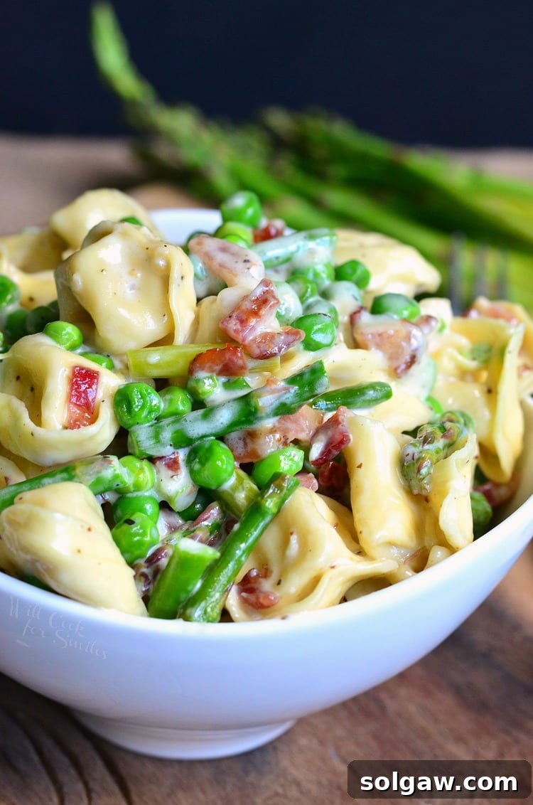Creamy Spring Tortellini with Peas Asparagus and Bacon