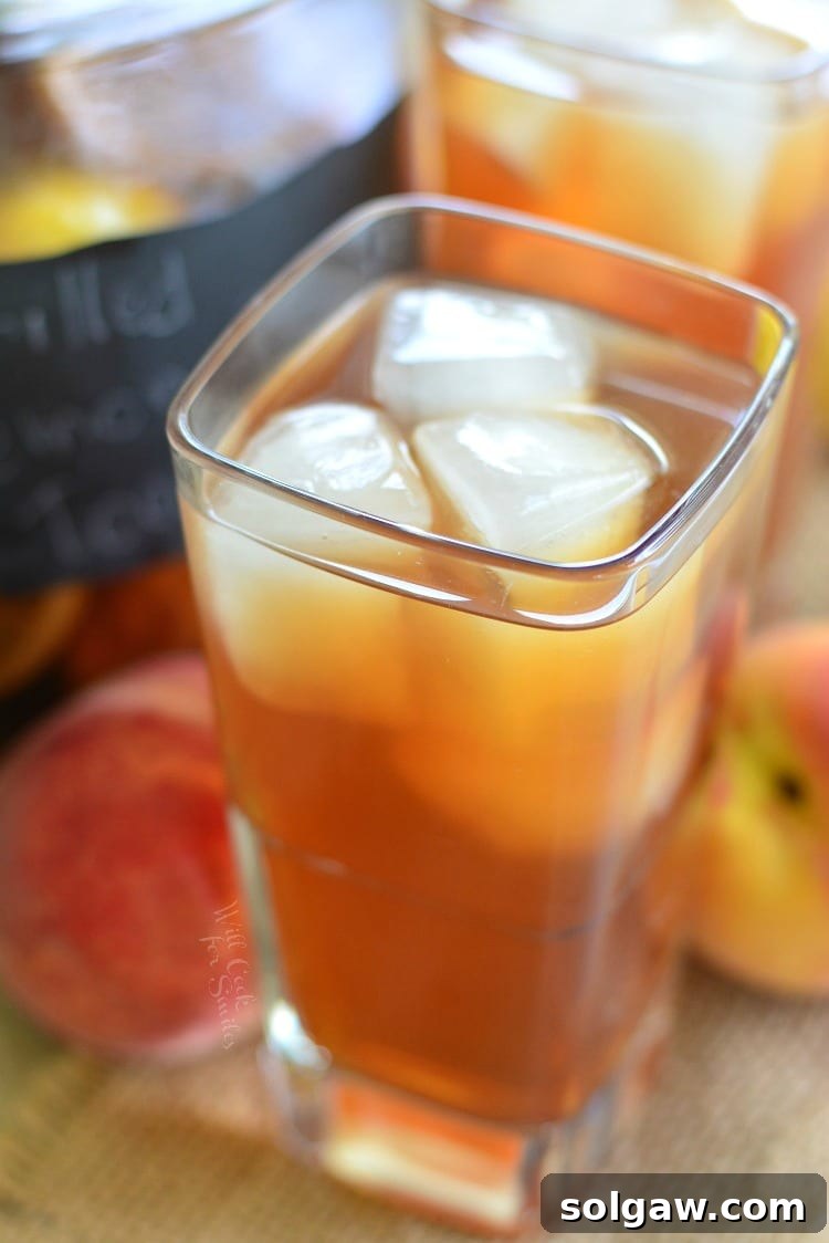 top view of Grilled Lemon Peach Iced Tea in a glass with ice 