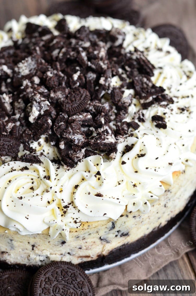 The Ultimate Oreo Cheesecake, a visually stunning and rich dessert, presented beautifully on a table, ready to be enjoyed.