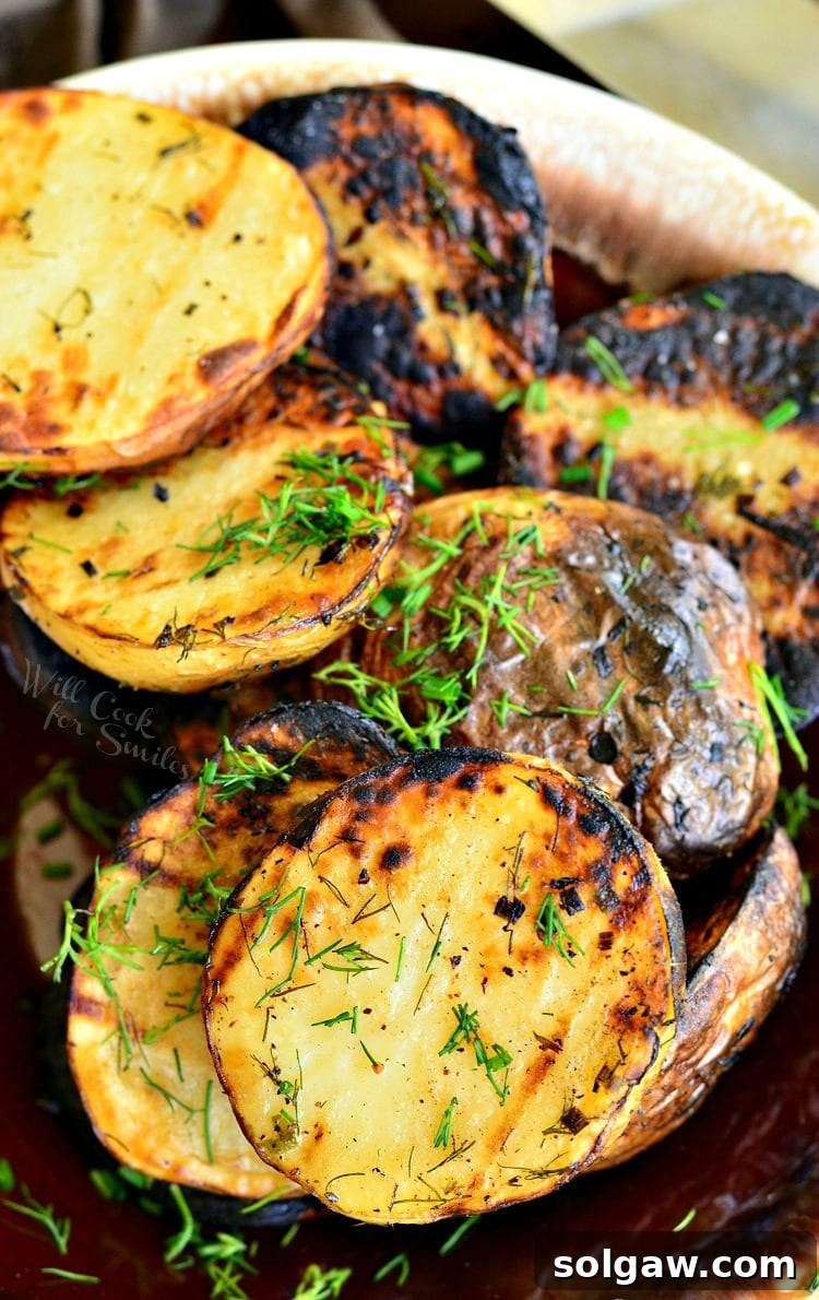 Herbed Grilled Potatoes. Balsamic vinegar, fresh herbs, smoky grilled flavor, all of that makes these crispy potatoes a DELICIOUS side for your grilled meats.
