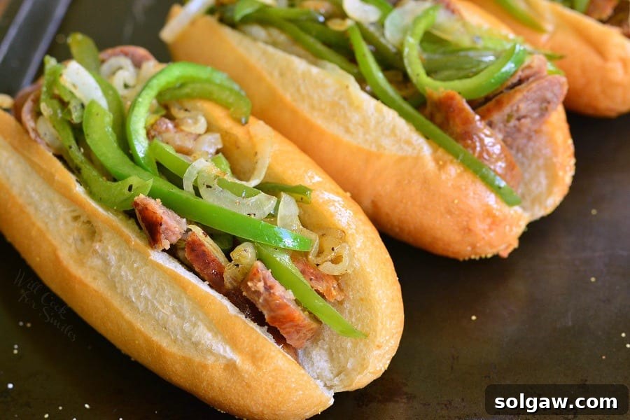 Philly Sausage Cheesesteak Hoagies 4 Philly Cheese "Steak" Sausage Hoagies on a baking dish