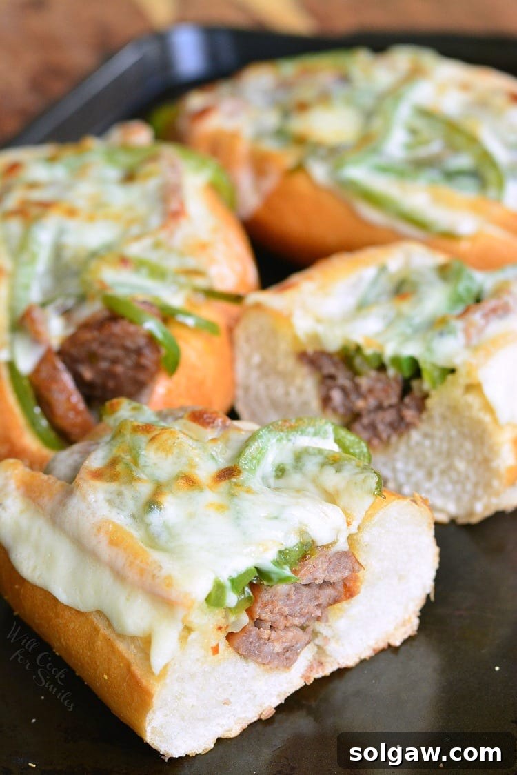 Philly Sausage Cheesesteak Hoagies 6 Philly Cheese "Steak" Sausage Hoagies on a baking sheet