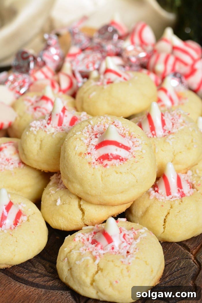 Peppermint Thumbprint Cookies with Hershey's Candy Cane Kisses