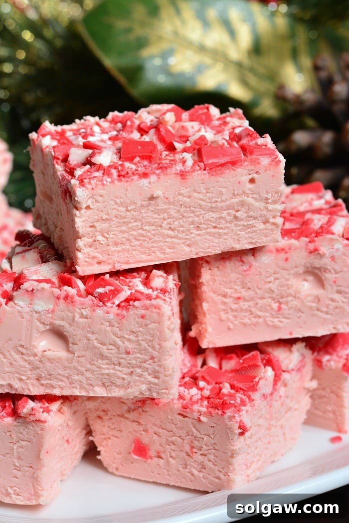 Finished Peppermint White Chocolate Fudge on a white plate