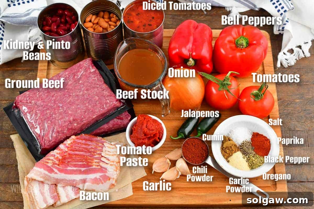 A selection of fresh ingredients laid out on a cutting board, ready to be prepared for the homemade beef chili recipe, including diced bell peppers, onions, tomatoes, and various spices.