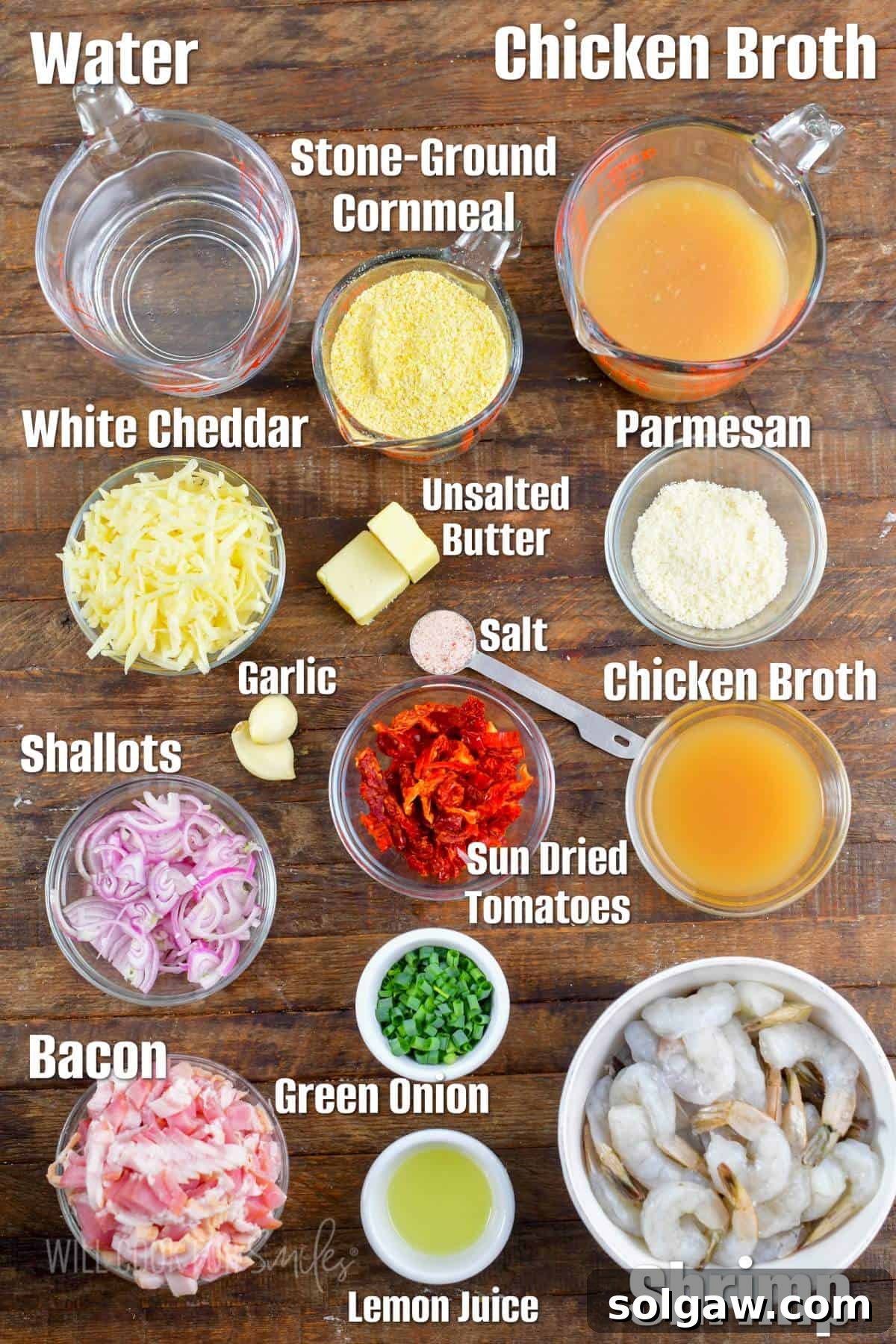 Southern Comfort Shrimp and Grits 3 Bowls of raw ingredients for shrimp and grits including shrimp, bacon, grits, and vegetables arranged on a wooden board.