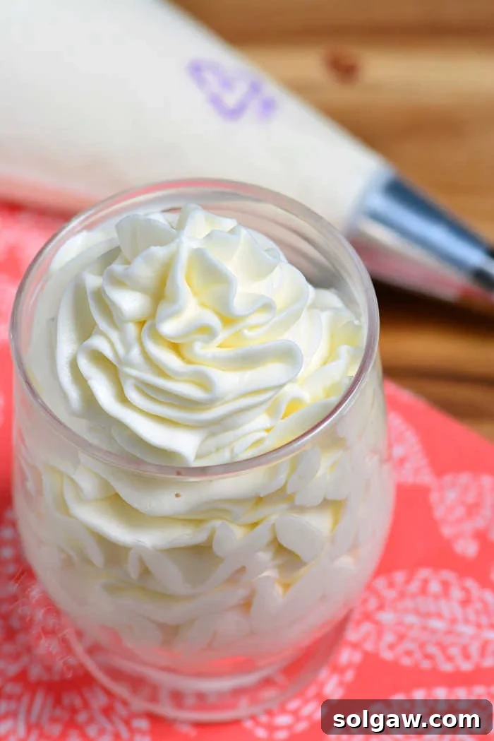 Close up of a dessert with whipped cream cheese frosting