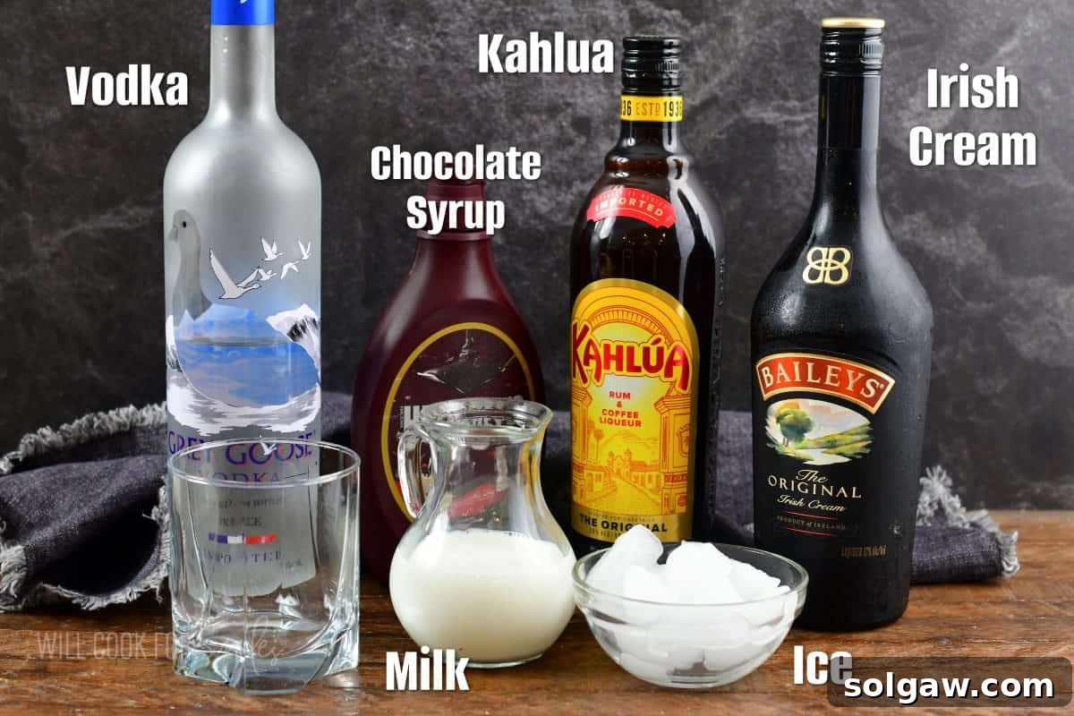 Fork in the Torrent 3 Labeled ingredients to make a classic Mudslide on the rocks, featuring Irish cream, Kahlua, vodka, and milk.