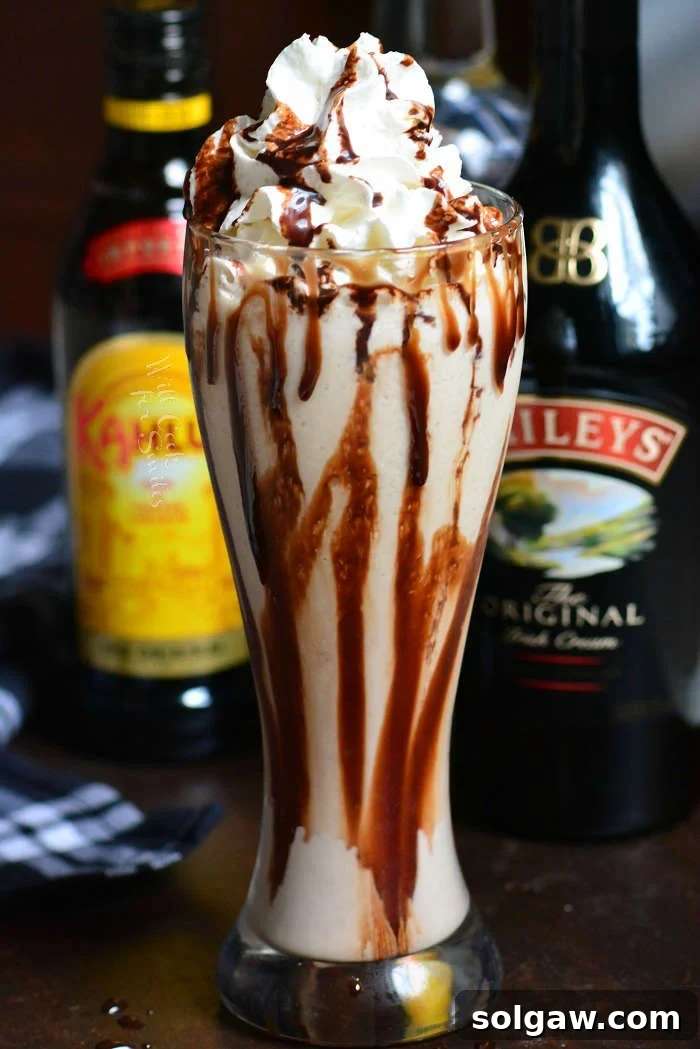 A delicious Mudslide cocktail, prepared both frozen and on the rocks, ready to be served.