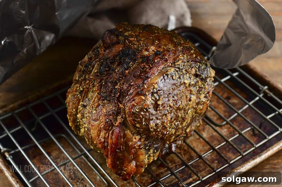 roasted prime rib resting on the wire rack after cooking.