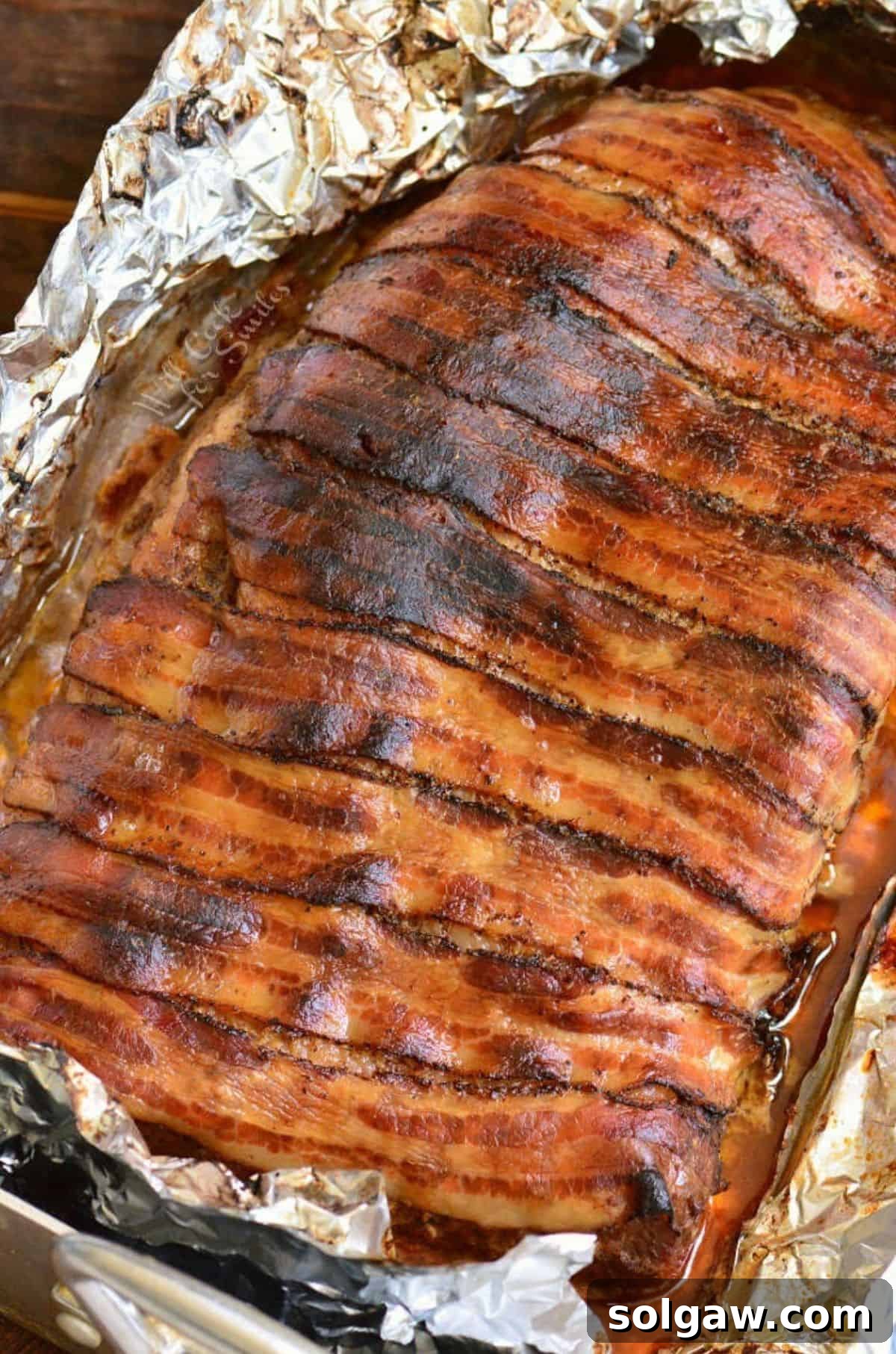 cooked bacon wrapped whole been brisket in the roasting pan in foil.