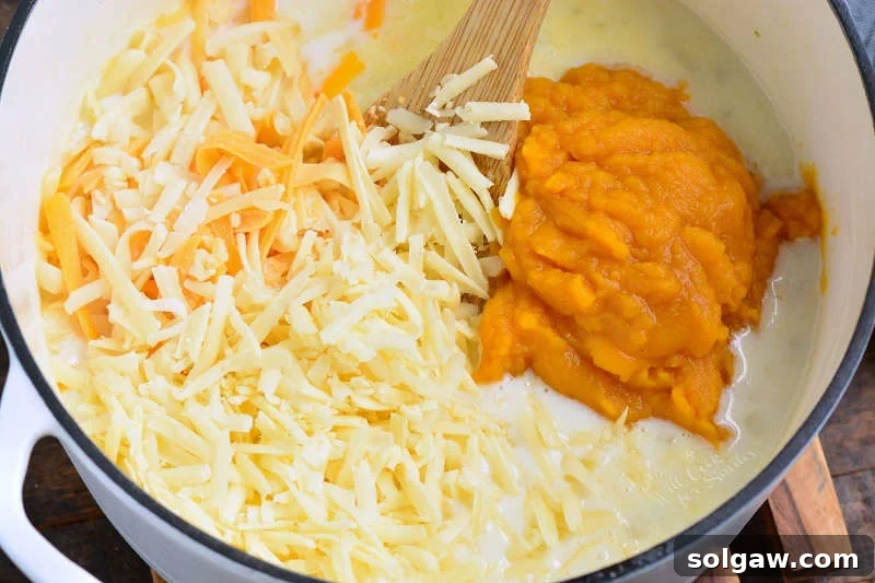 Rich and creamy pumpkin cheese sauce being made