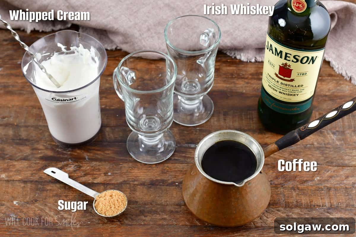 Ingredients for Irish Coffee, including coffee beans, a bottle of Jameson Irish whiskey, brown sugar, and heavy cream, arranged on a wooden surface.