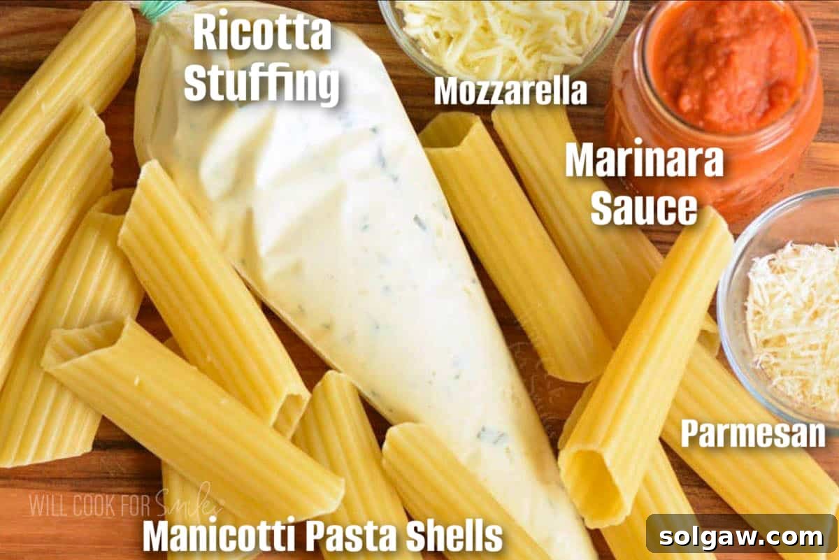 Irresistible Baked Manicotti 3 A beautifully arranged selection of essential ingredients for making manicotti, including pasta shells, various cheeses, fresh herbs, and tomatoes, all on a rustic wooden cutting board.