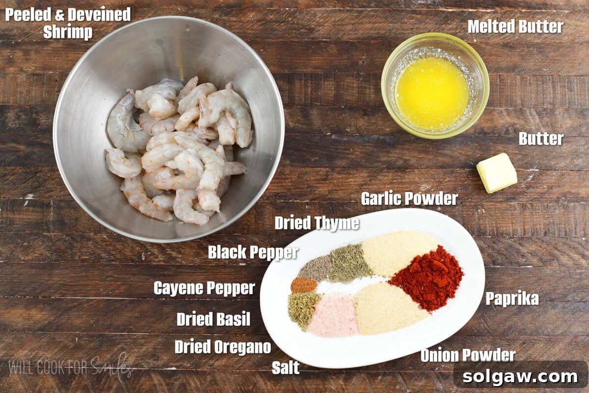 Smoky Cajun Shrimp 3 labeled ingredients for blackened shrimp on the wooden background.