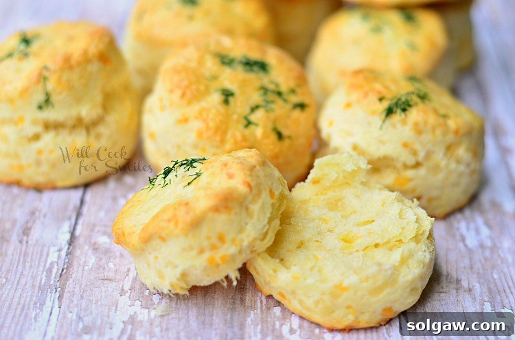 Artisan Three-Cheese Scones 3 Close-up of baked Three Cheese Scones with herbs