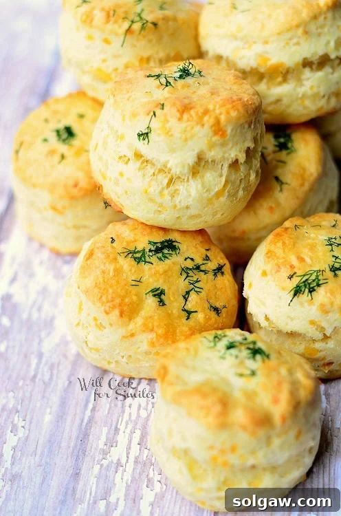 Artisan Three-Cheese Scones 5 stack three cheese dinner scones on wood table