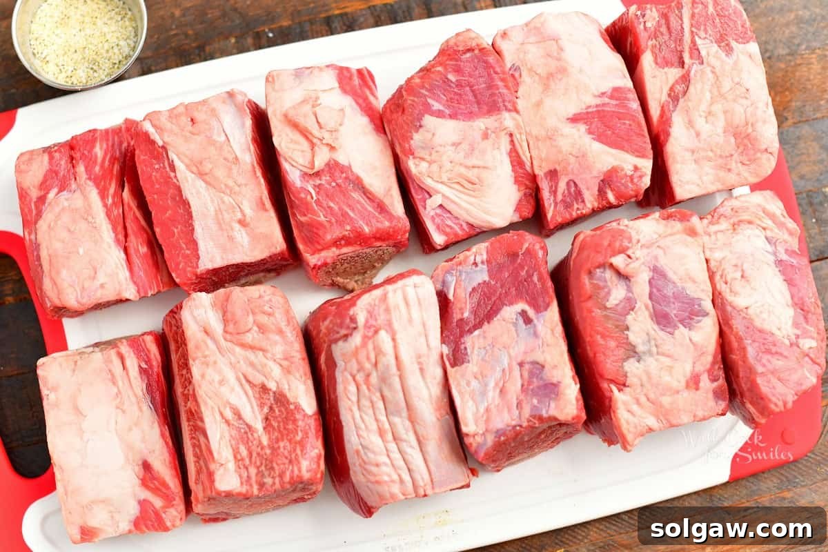 raw beef ribs on cutting board