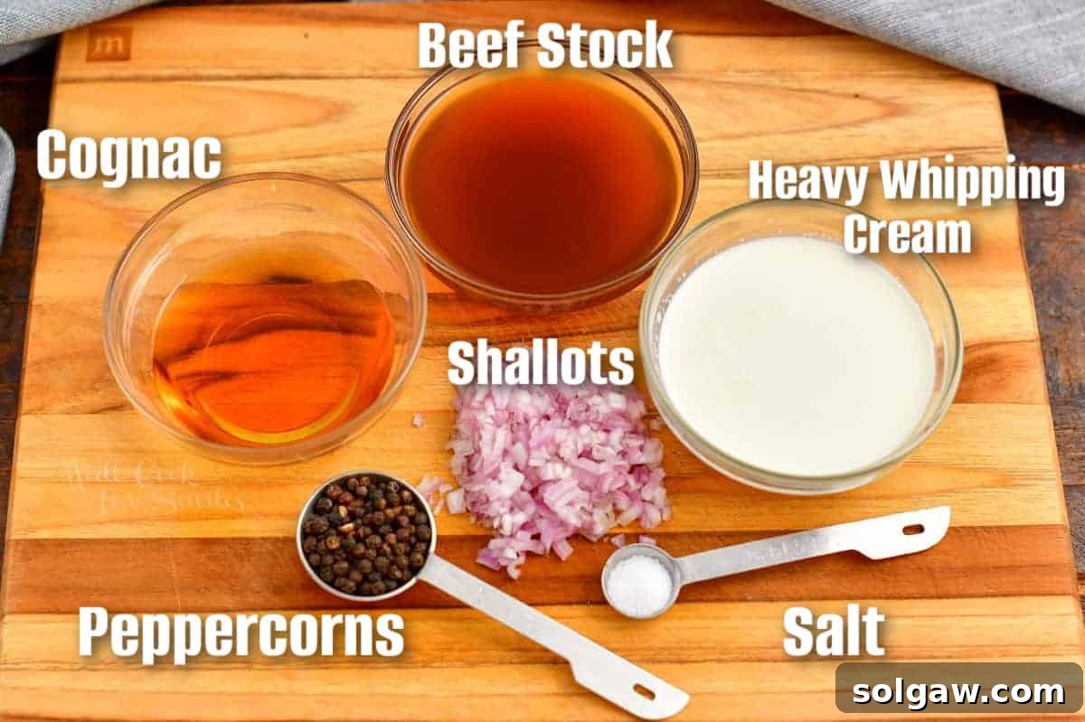 Carefully arranged key ingredients for peppercorn sauce, including whole peppercorns, shallots, and cream, on a wooden cutting board.