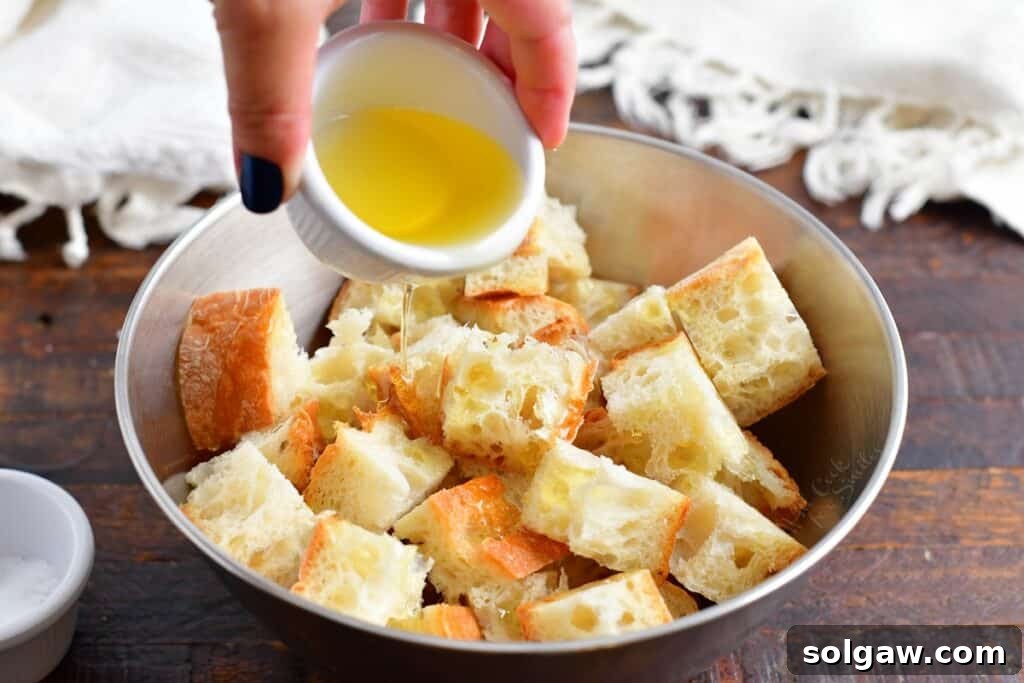 Ciabatta bread cubed, ready for seasoning.