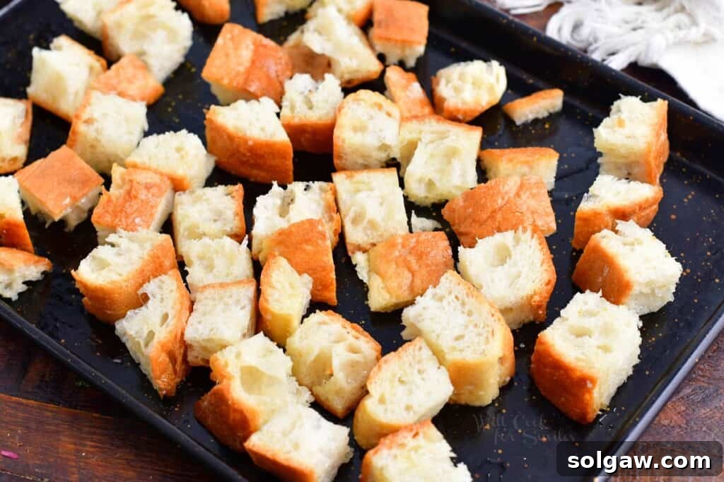 Bread cubes tossed with olive oil and salt.