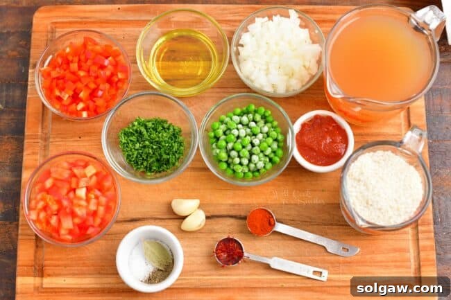 A Family's Cherished Paella 3 Fresh ingredients for paella, including various vegetables, rice, and olive oil, are neatly arranged on a rustic wooden cutting board.