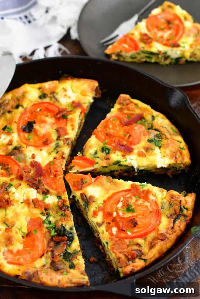 Simple Skillet Frittata 11 top view of sliced frittata in a cast iron skillet