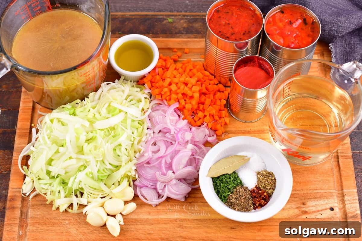 ingredients to make Cioppino on the cutting board.