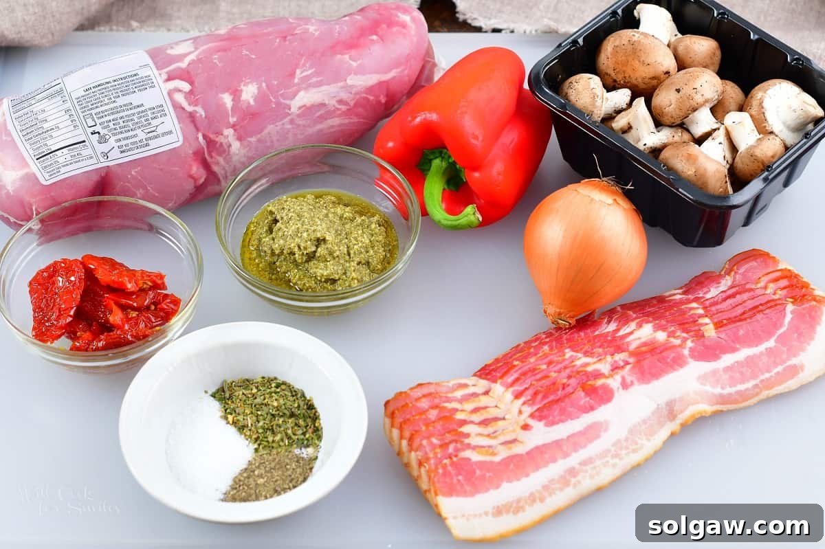 ingredients for stuffed pork tenderloin on the cutting board