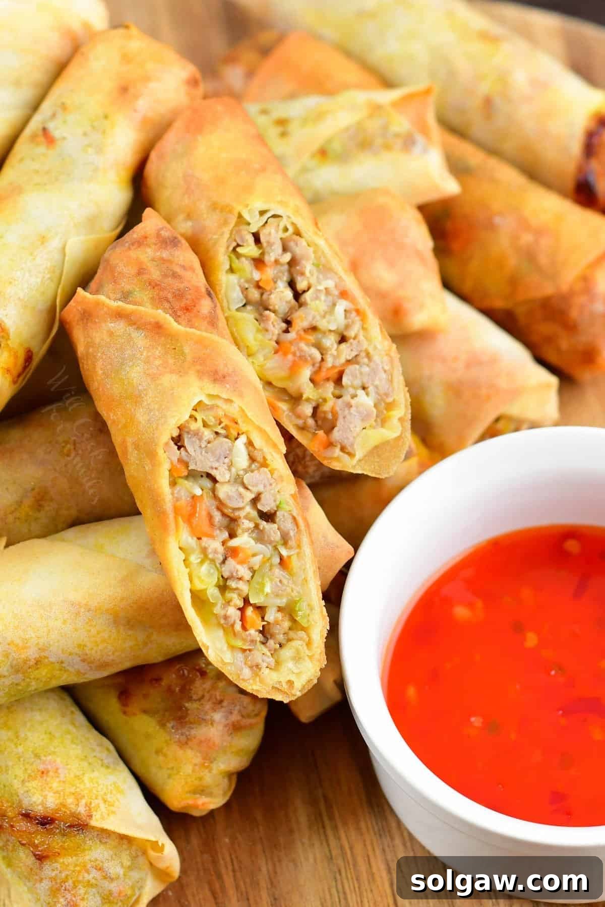 Cut Thai spring roll on layer of spring rolls