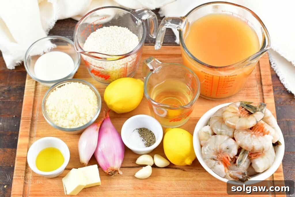 Fresh ingredients for Lemon Risotto and Lemon Pepper Shrimp laid out on a wooden cutting board, including lemons, shrimp, shallots, garlic, and Arborio rice.