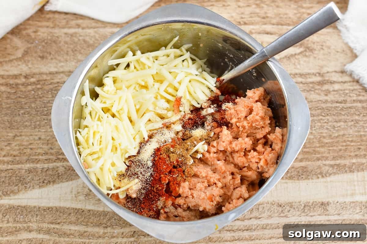mixture for refried bean in a mixing bowl