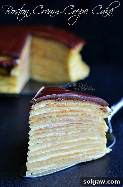 Decadent Pecan Caramel Pumpkin Pie 10 A tempting slice of Boston Cream Crepe Cake, revealing its delicate layers.