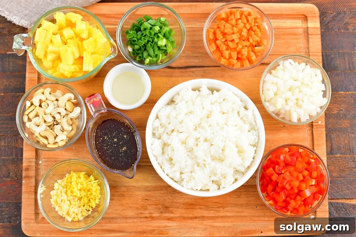 ingredients for pineapple fried rice on the board