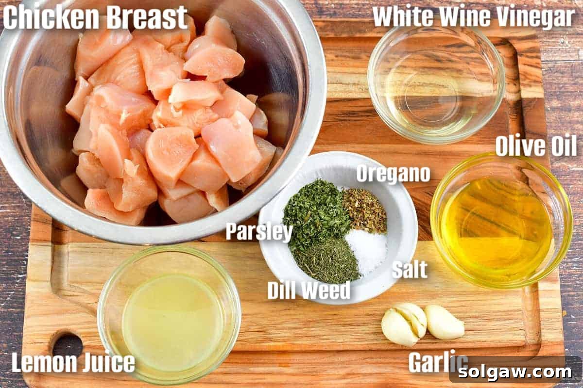Chicken Souvlaki: Grill or Pan-Fry Your Way to Perfection 3 labeled ingredients to make chicken souvlaki marinade on the cutting board.