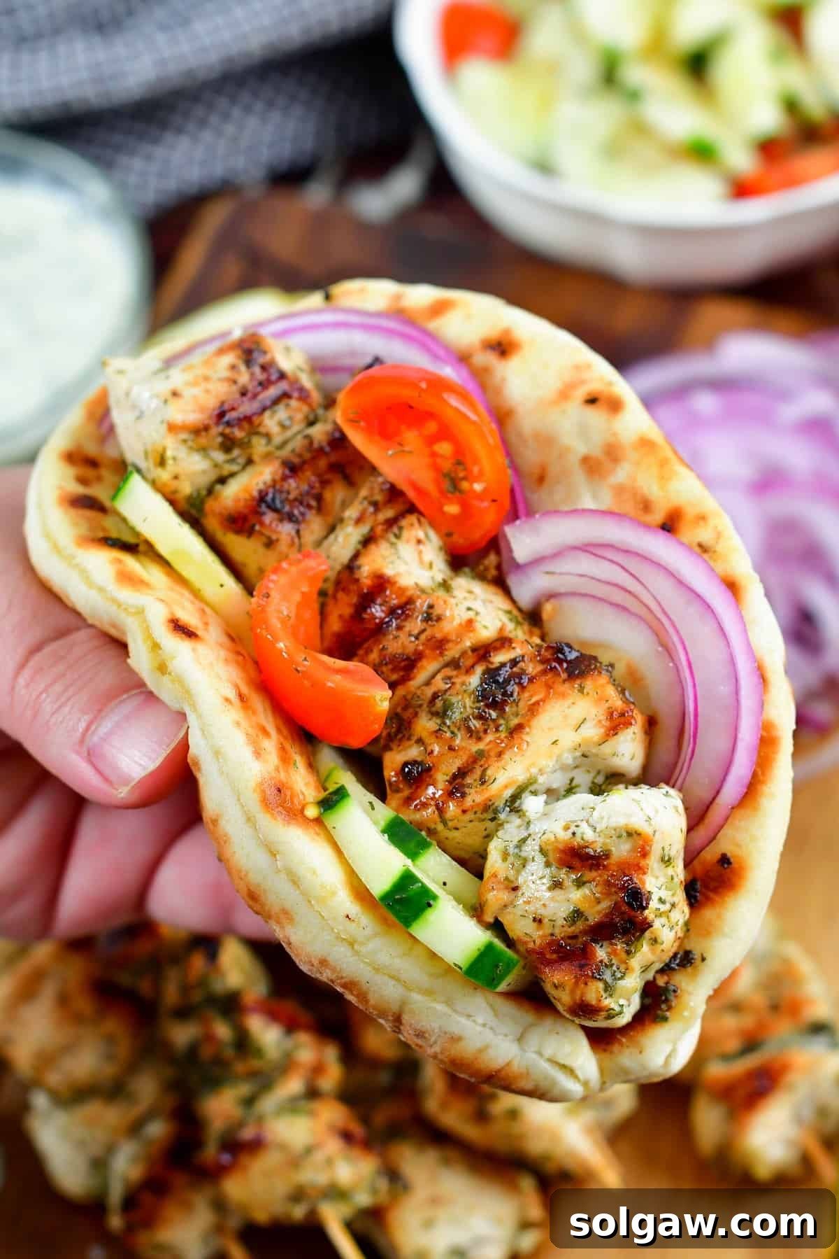 Chicken Souvlaki: Grill or Pan-Fry Your Way to Perfection 8 grilled chicken souvlaki in a pita with veggies