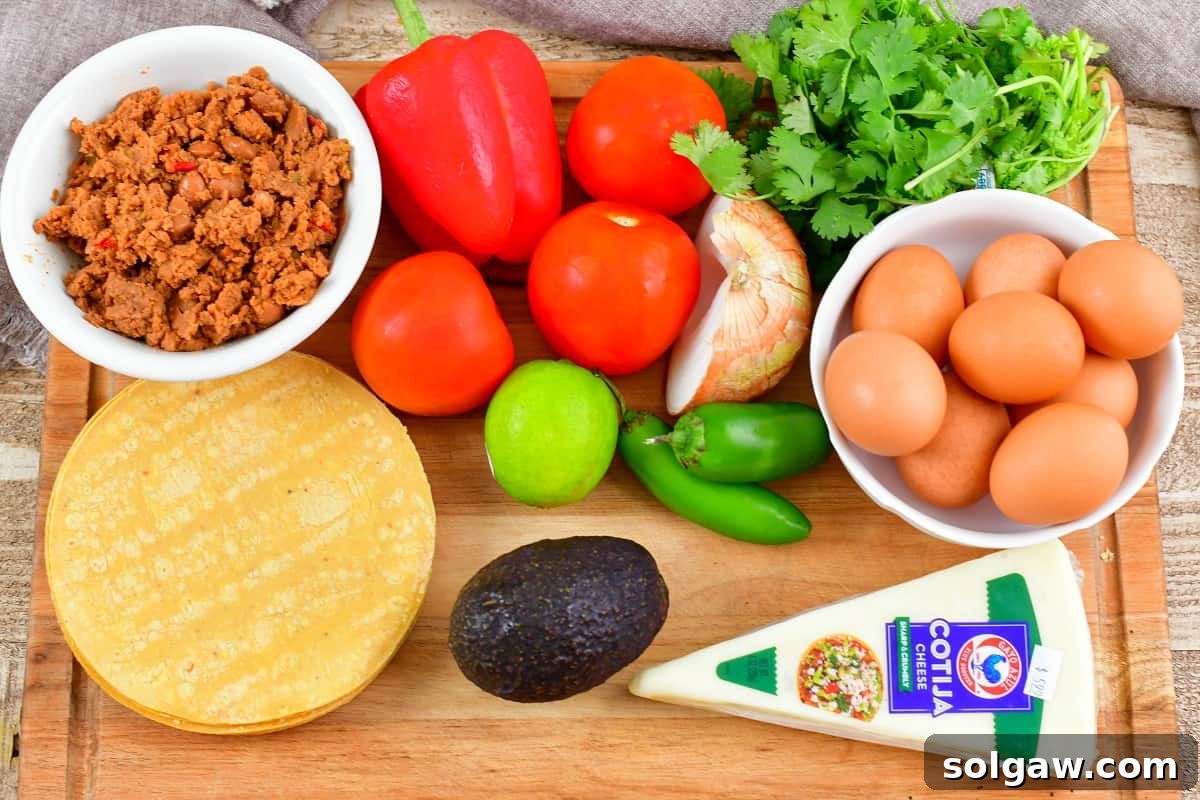 Ingredients for Huevos Rancheros laid out on a wooden cutting board.