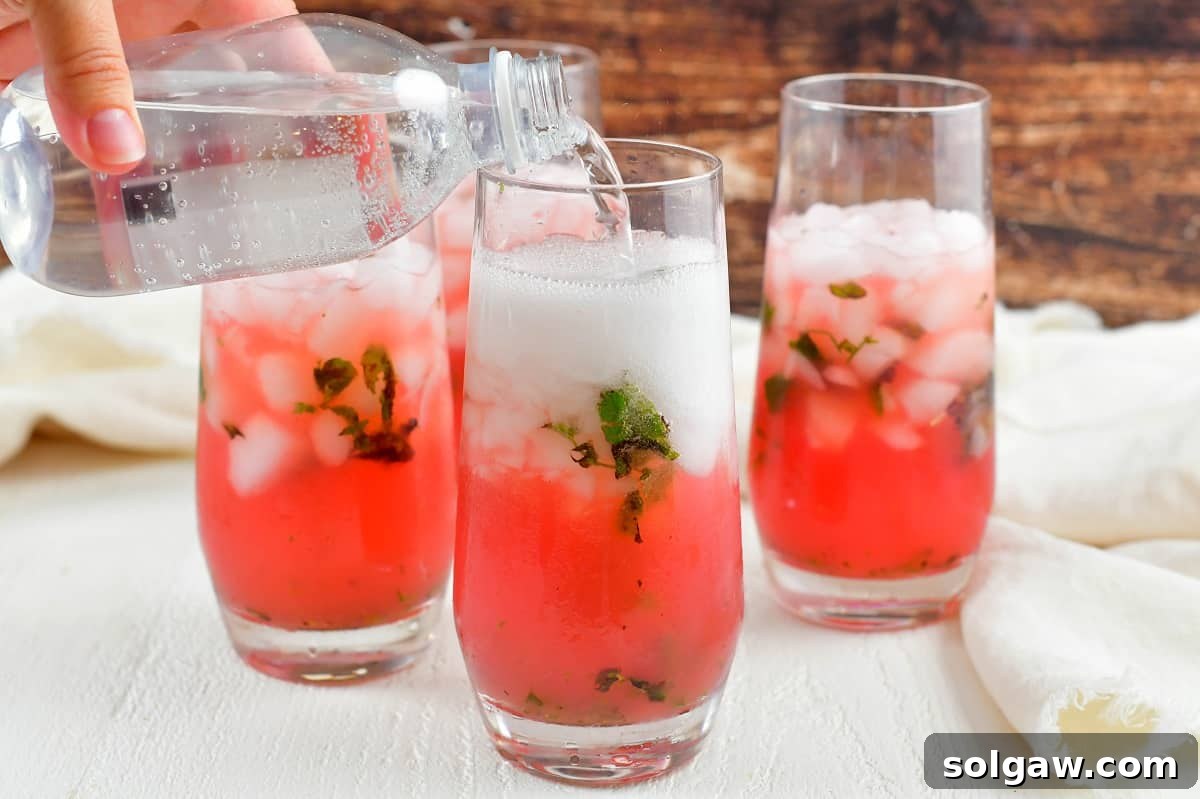 Topping watermelon mojito with soda water