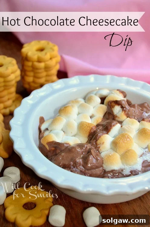 Golden Caramelized Onion Cheese Swirls 11 Hot Chocolate Dip in a bowl with marshmallows melted on top, ready for dipping.