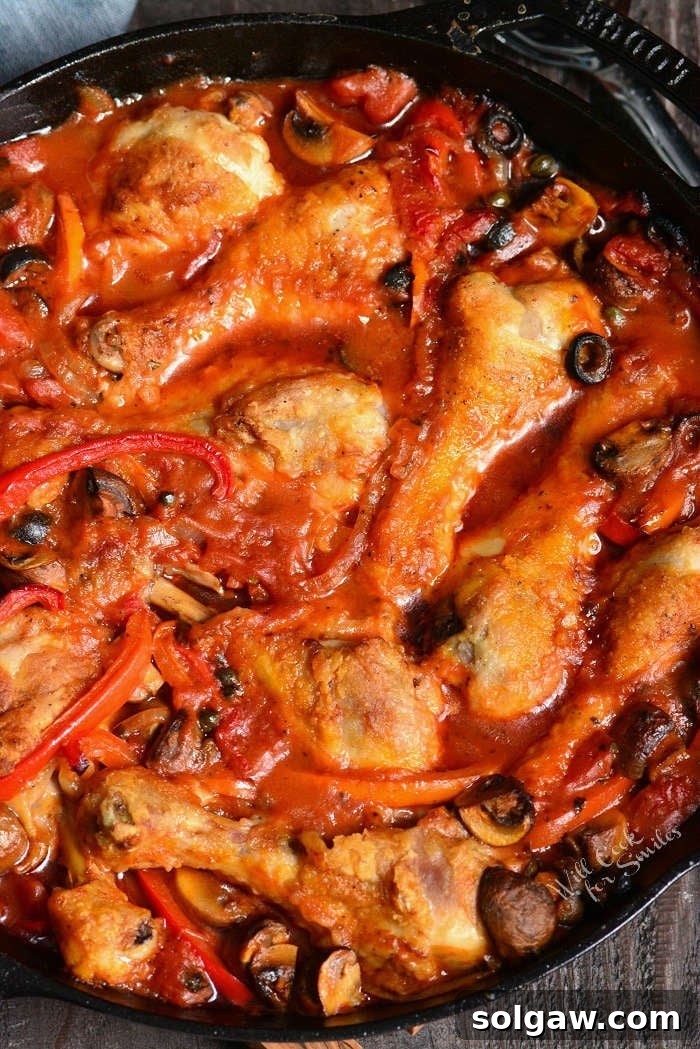 Chicken Cacciatore in a pan, showcasing the rich sauce and tender chicken