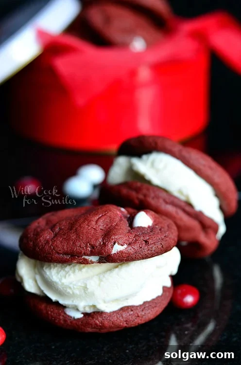 Cotton Candy Cloud Cookies 7 Red Velvet Ice Cream Sandwich Cookies on a black counter top