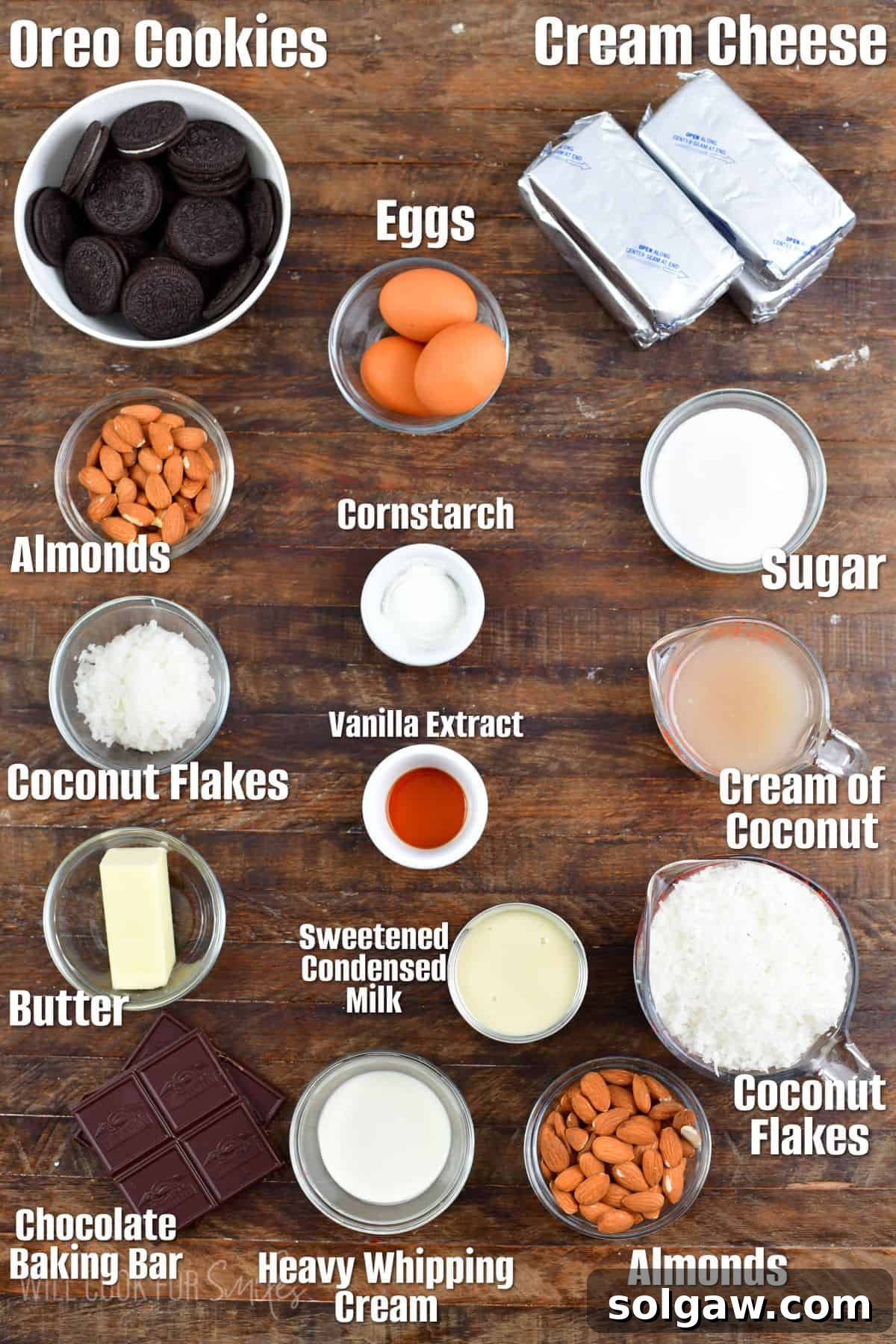 Labeled ingredients for Almond Joy cheesecake on a rustic wooden background.