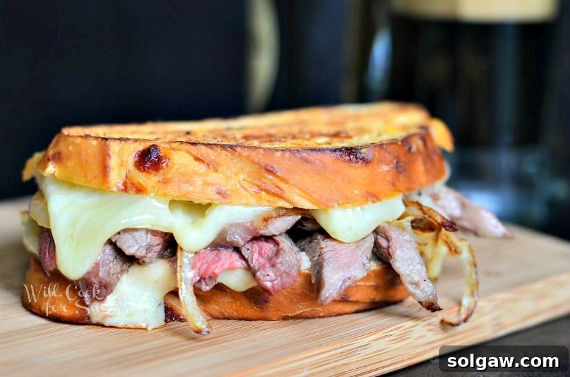 Steak and Onion Grilled Cheese ready to be eaten