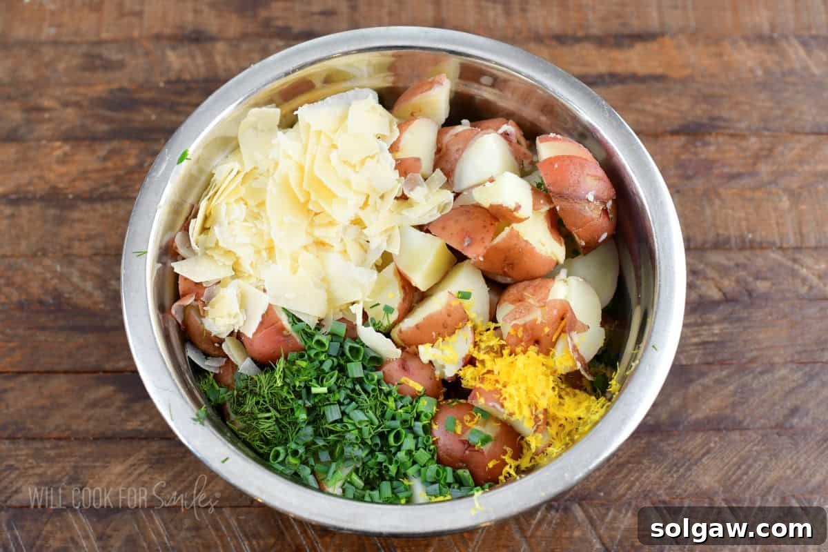 ingredients for the potato salad in a mixing bowl before mixing.