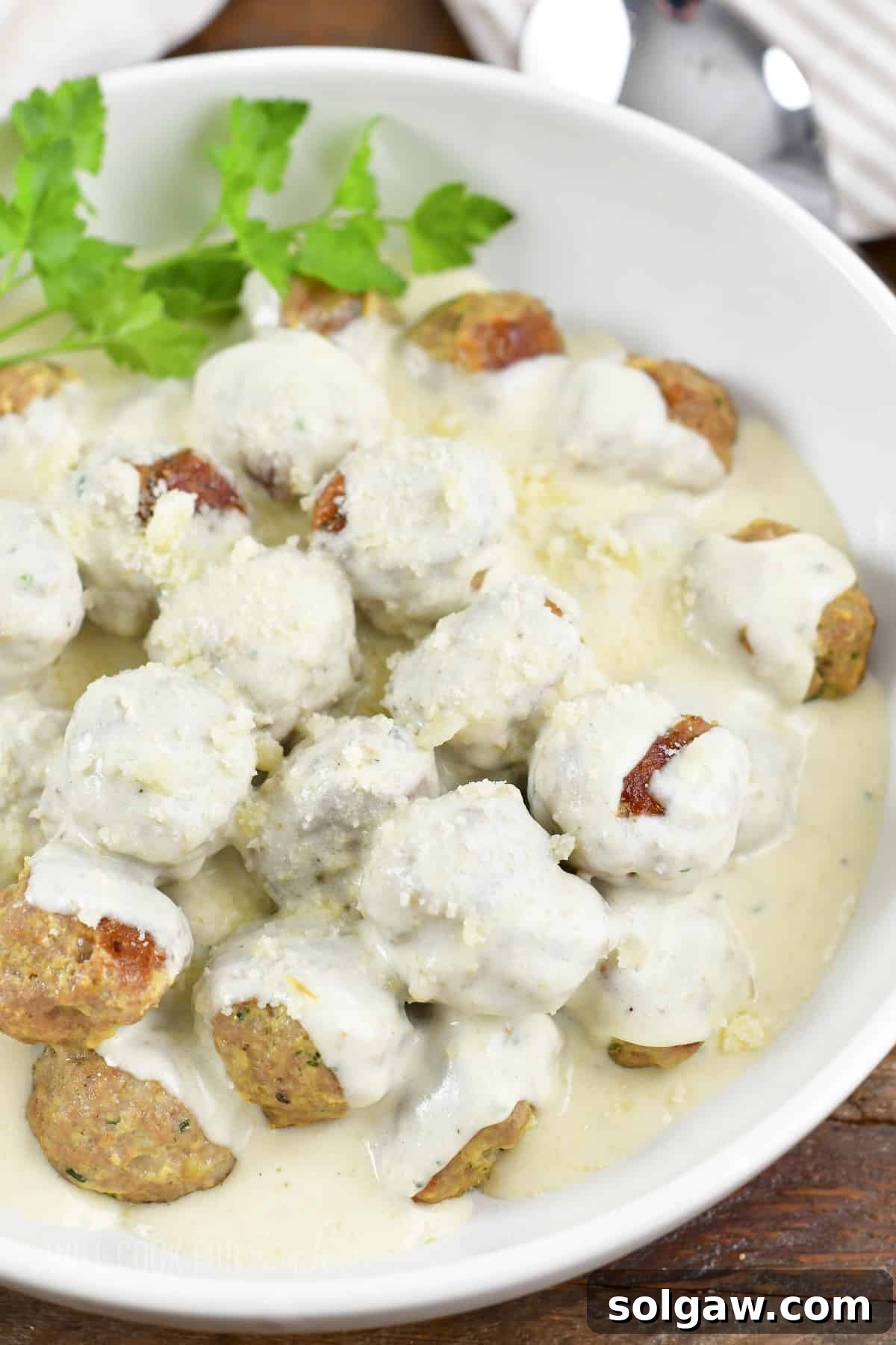 top view of turkey meatballs in creamy sauce.