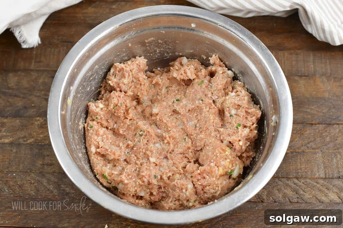mixed mixture for turkey meatballs in the bowl.